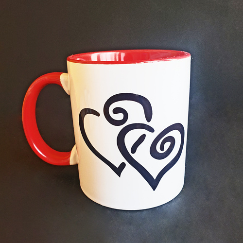 TAZA DE CORAZONES ENTRELAZADOS