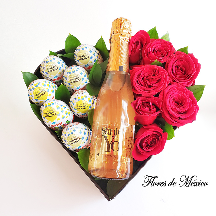 corazón con chocolates, rosas y vino